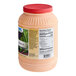 A plastic container of AAK Select Russian Dressing with a label.