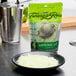 A bowl of Twang-a-Rita lime salt on a table.