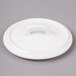 A white Bon Chef porcelain lid with a handle.
