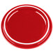 A red porcelain lid with a white rim.