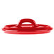 A red lid with a handle.
