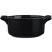 A matte black porcelain Bon Chef cocotte with handles.