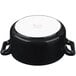 A matte black Bon Chef porcelain cocotte with handles.