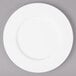 A Bon Chef white bone china salad plate with a wide rim.