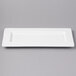 A white rectangular Bon Chef bone china plate.