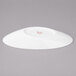 A white Bon Chef slanted oval porcelain bowl.