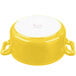 A yellow porcelain Bon Chef cocotte with handles.