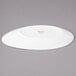 A white Bon Chef slanted oval porcelain plate.