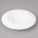 A white bowl with a circular center.