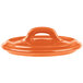 An orange Bon Chef porcelain cocotte lid with a handle.