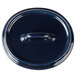 A cobalt blue porcelain lid with a handle.