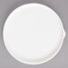 A white Bon Chef porcelain salad plate with stacked lines on the rim.