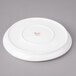 A white Bon Chef porcelain plate.