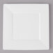 A white square Bon Chef bone china plate with a white rim.