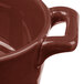 A Bon Chef burnt umber porcelain oval cocotte with a handle.