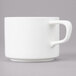 A white Bon Chef porcelain cup with a handle.