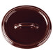 A brown Bon Chef porcelain lid with a handle.