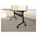 A black metal frame with wheels for a Safco Flip-n-Go seminar table.