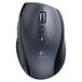 A Logitech M705 Marathon wireless laser mouse on a grey surface.