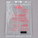 A clear plastic bag with red text containing small pink liquid packets.