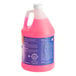 A pink bottle of Noble Chemical TDS Rinse additive.