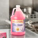 A pink box of Noble Chemical TDS Rinse additive on a counter.