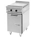 A large stainless steel Garland electric range with 2 boiler tops and storage base.