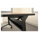 A black steel Safco Flip-n-Go seminar table base.