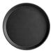A black round Cambro non-skid serving tray with the word "Camo" on it.