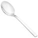 A close-up of a Walco stainless steel demitasse spoon with a silver handle.