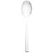 A Walco stainless steel teaspoon with a white handle.