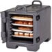 A front-loading Cambro charcoal gray insulated tray and food pan carrier filled with baked goods.