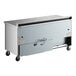 A True worktop refrigerator with a stainless steel top and sides.