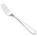 A close-up of a Walco European table fork with a silver handle.