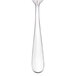 A close-up of a Walco stainless steel table fork with a white background.