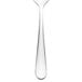 A Walco stainless steel teaspoon with a white handle and a silver spoon.