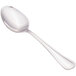 A close-up of a Walco Pacific Rim stainless steel serving spoon with a silver handle.