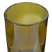 A Libbey wine tumbler made from a dark olive wine bottle with a brown base and green rim.