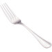 A close-up of a Walco Pacific Rim stainless steel dinner fork with a silver handle.