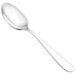 A Walco 18/10 stainless steel dessert spoon with a silver handle on a white background.