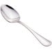 A close-up of a Walco Pacific Rim stainless steel dessert spoon. The handle is silver.