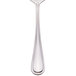 A Walco Pacific Rim stainless steel dessert spoon with a handle.