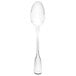 A Walco Luxor stainless steel serving spoon with a white handle on a white background.