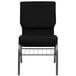 A Flash Furniture black church chair with silver metal legs.