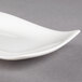 A close up of a Villeroy & Boch white porcelain rectangular plate.