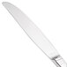 A Walco stainless steel table knife with a hollow silver handle.