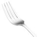 A close-up of a Walco stainless steel salad fork with a silver handle.