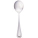 A close-up of a Walco stainless steel bouillon spoon with a silver handle.