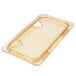 A Carlisle amber plastic lid with one notch on a clear plastic container.