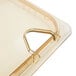 A close up of a Carlisle amber plastic hinged lid with one notch.